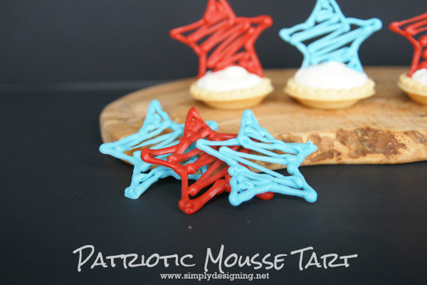 Patriotic Mousse Tart with Chocolate Star  |  These look complicated but are really very simple!  Pinning for later!  | #4thofjuly #stars #memorialday #recipe #desserts 