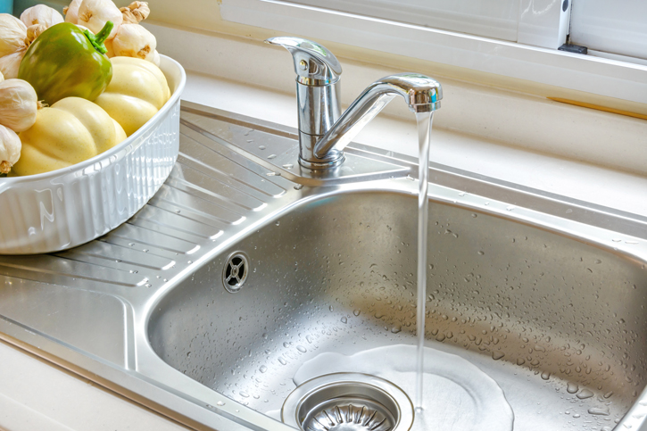kitchen sink fills with water have to run disposal