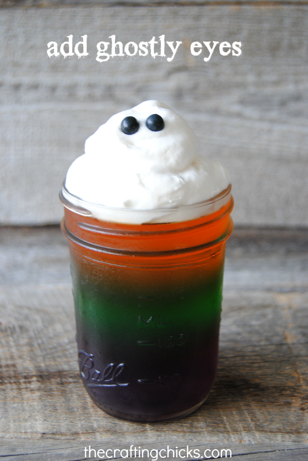 Frightfully fruity and fun, these striped Halloween Jell-O Jars are a great Halloween treat! Don't forget the whipped topping ghosts!