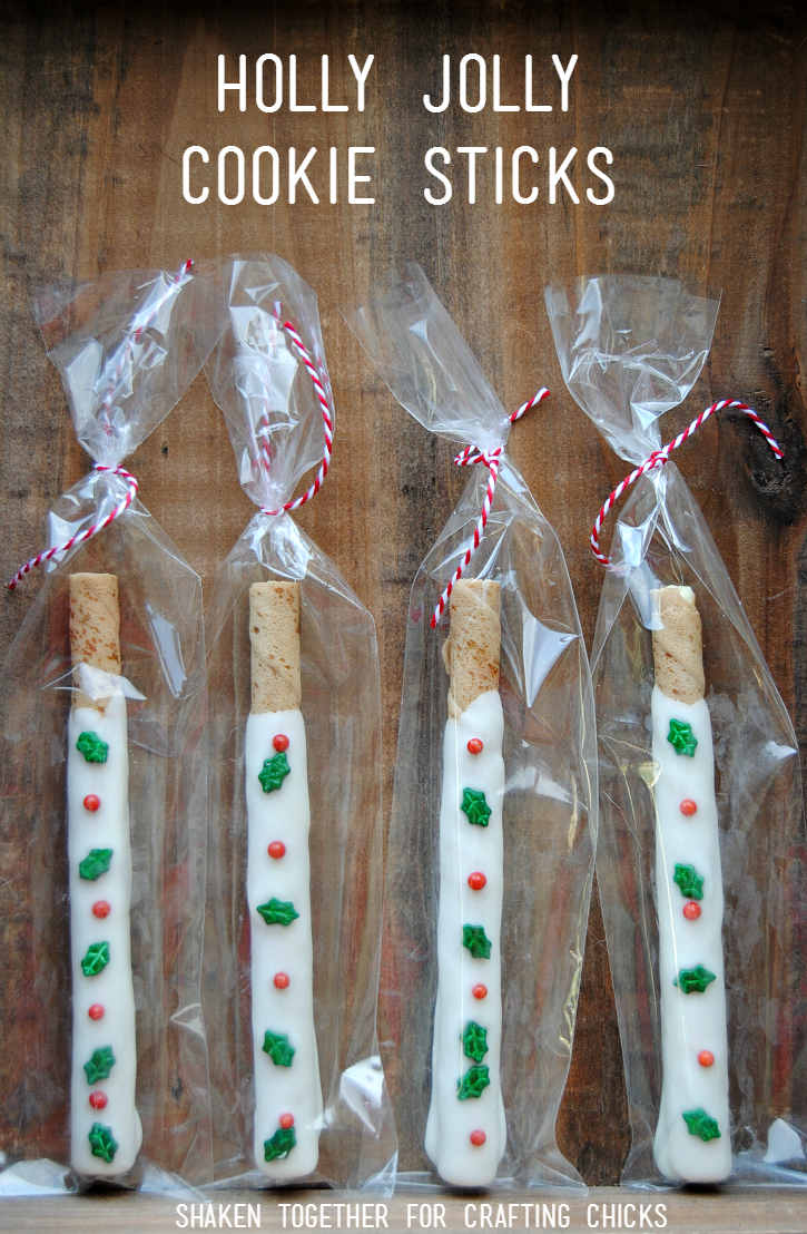 Holly Jolly Cookie Sticks are the perfect no bake treat for family, friends and neighbors! Vanilla filled cookie sticks are dipped in white chocolate and decorated with festive holly sprinkles!