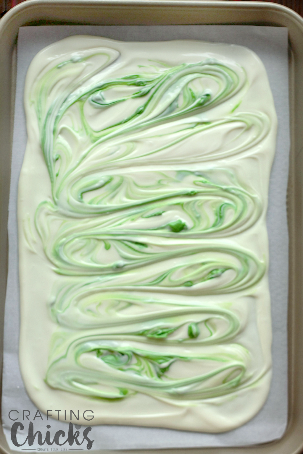 Carrot Cake Easter Bark gets a swirl from melted green chocolate ... get ready for sprinkles!