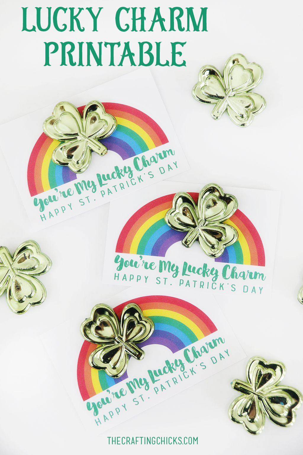 Rainbow printable with "You're my lucky Charm. Happy St. Patrick's Day." on it with shiny green clovers.