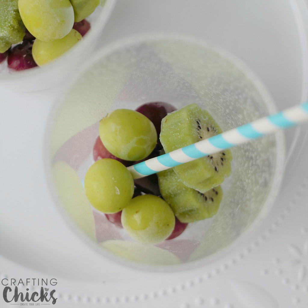 Rainbow Fruit Water with Frozen Fruit - up next - frozen green grapes!