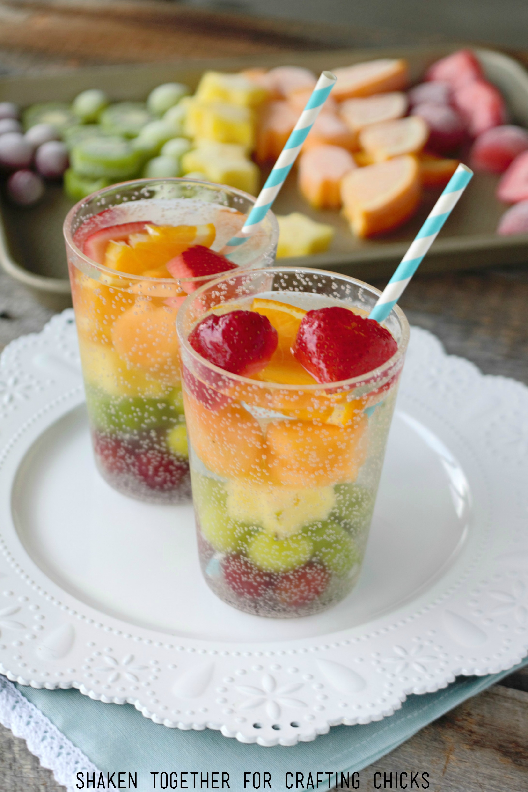 Refreshing Rainbow Fruit Water with Frozen Fruit is a healthy and delicious way to stay hydrated all Summer long!