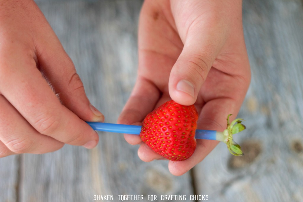 Easy tip for making Banana Split Pudding Cups: a drinking straw pushed through the bottom of a strawberry is a quick and easy way to remove the leaves!