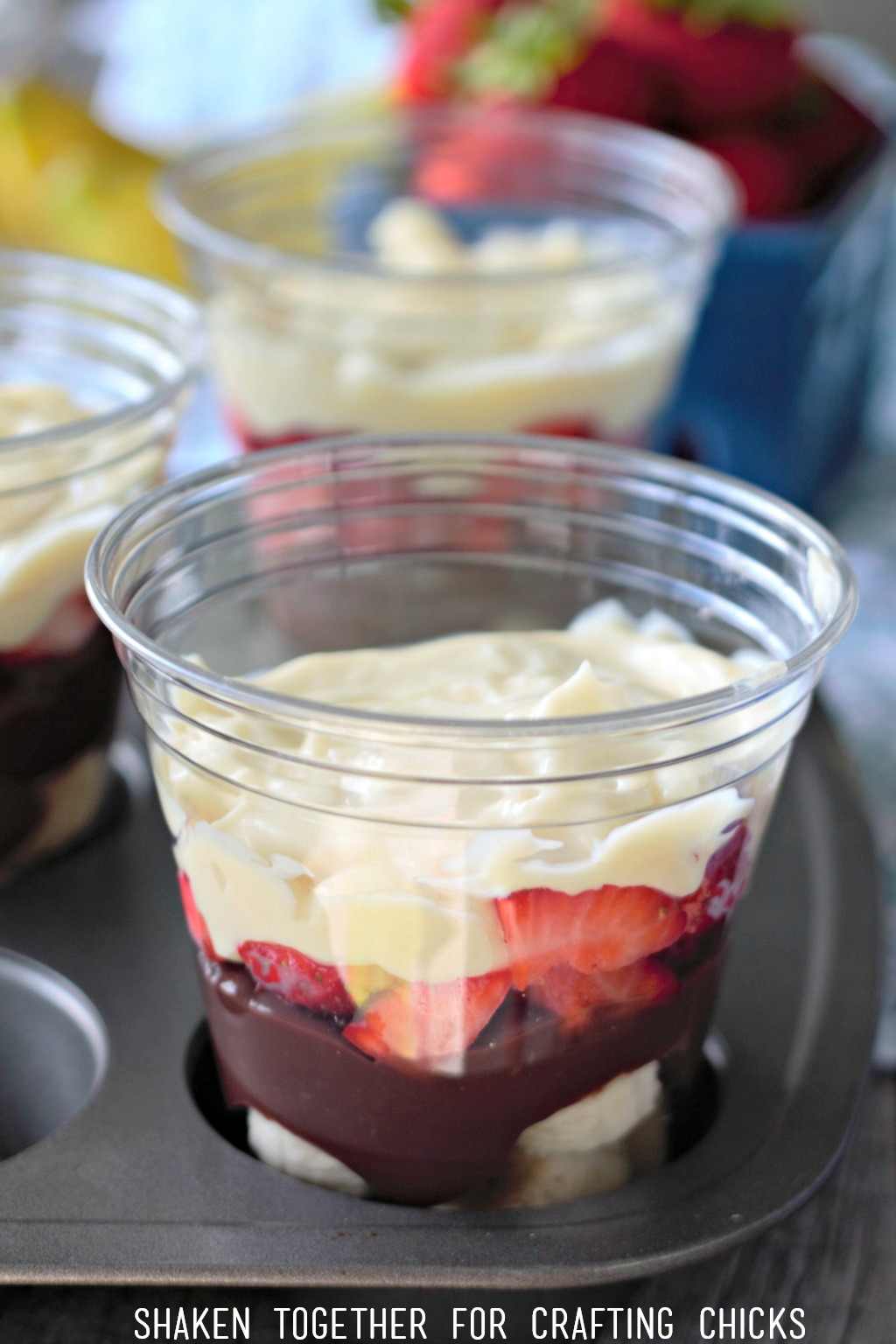 Banana Split Pudding Cups have delicious layers of fruit, pudding, whipped topping an of course - sprinkles!