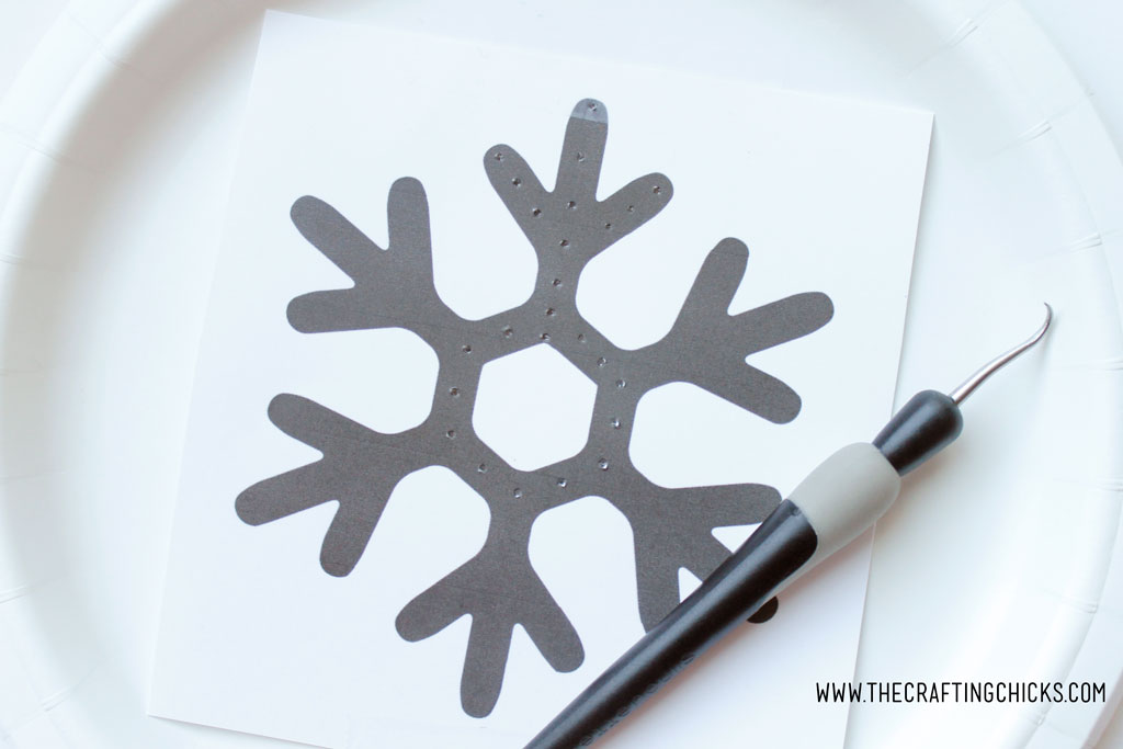 Snowflake Paper Plate Kids' Craft is a fun project for kids to work on. They will love using fine motor skills to create a snowflake with yarn.