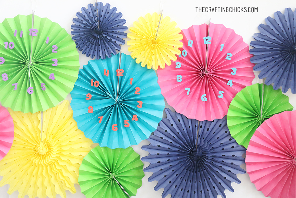 DIY New Year's Eve Party Clock Backdrop are perfect for any New Year's Eve Party. This craft is easy enough for kids to create.