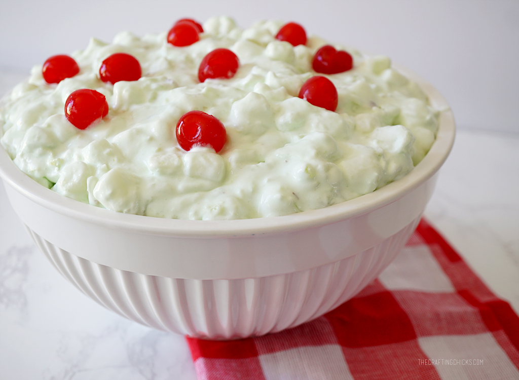 Watergate Salad with cherries on top.