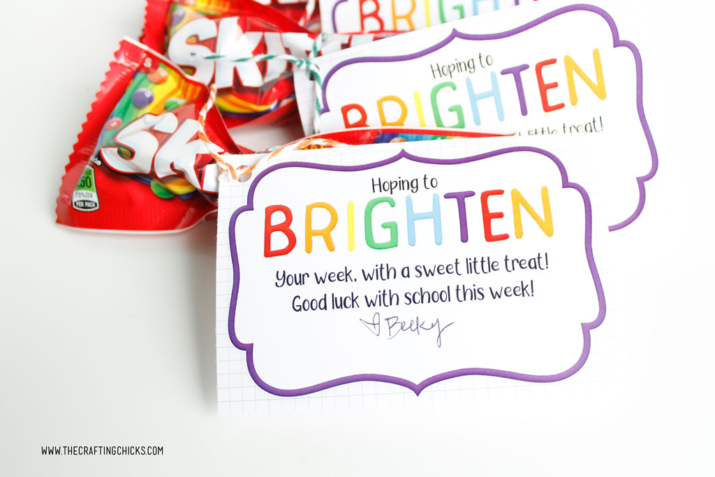 Brighten your day gift tag printable tied onto Skittles candy for a fun gift idea.