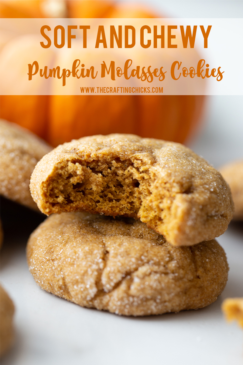 Pumpkin Molasses Cookies stacked with a bite taken out of the top cookie.
