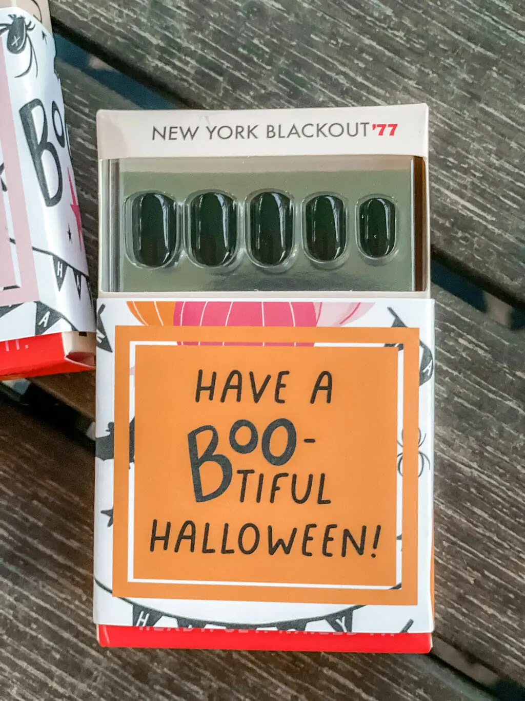 New York Blackout Hello Love Inc. press on nails in package with printable gift tag wrapped around the box.