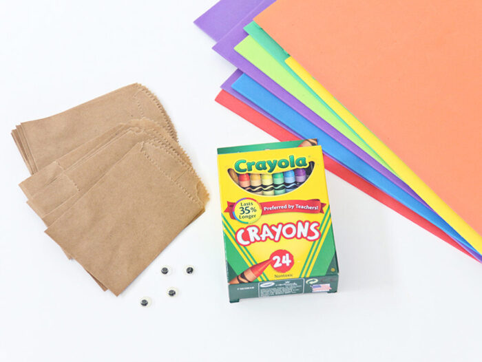 Simple Thanksgiving kids craft using crayons, foam sheets, and paper bags